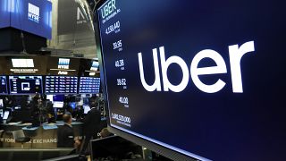 The logo for Uber appears above a trading post on the floor of the New York Stock Exchange, Thursday, May 30, 2019.