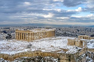 A rare sight of the ancient Acropolis covered in snow in Athens, Wednesday, Feb. 17, 2021