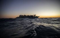 A crowded boat of migrants was intercepted 122 miles off the Libyan coast on February 12, 2021
