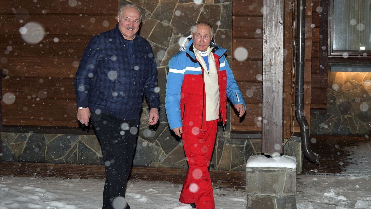Russian President Vladimir Putin, right, and Belarusian President Alexander Lukashenko walk during their meeting at the Black Sea resort of Sochi, Russia, Feb. 22, 2021.