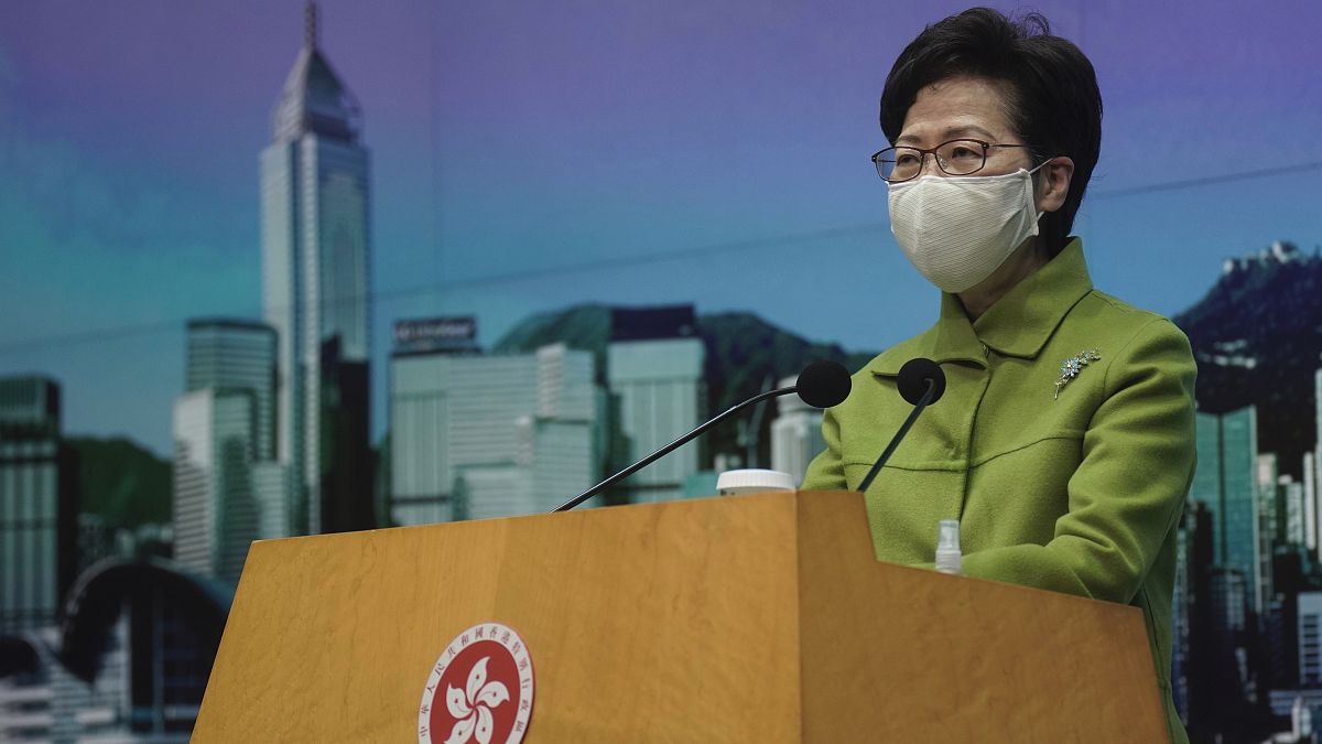 In this Jan. 26, 2021, file photo, Hong Kong Chief Executive Carrie Lam listens to reporters' questions during a press conference in Hong Kong.