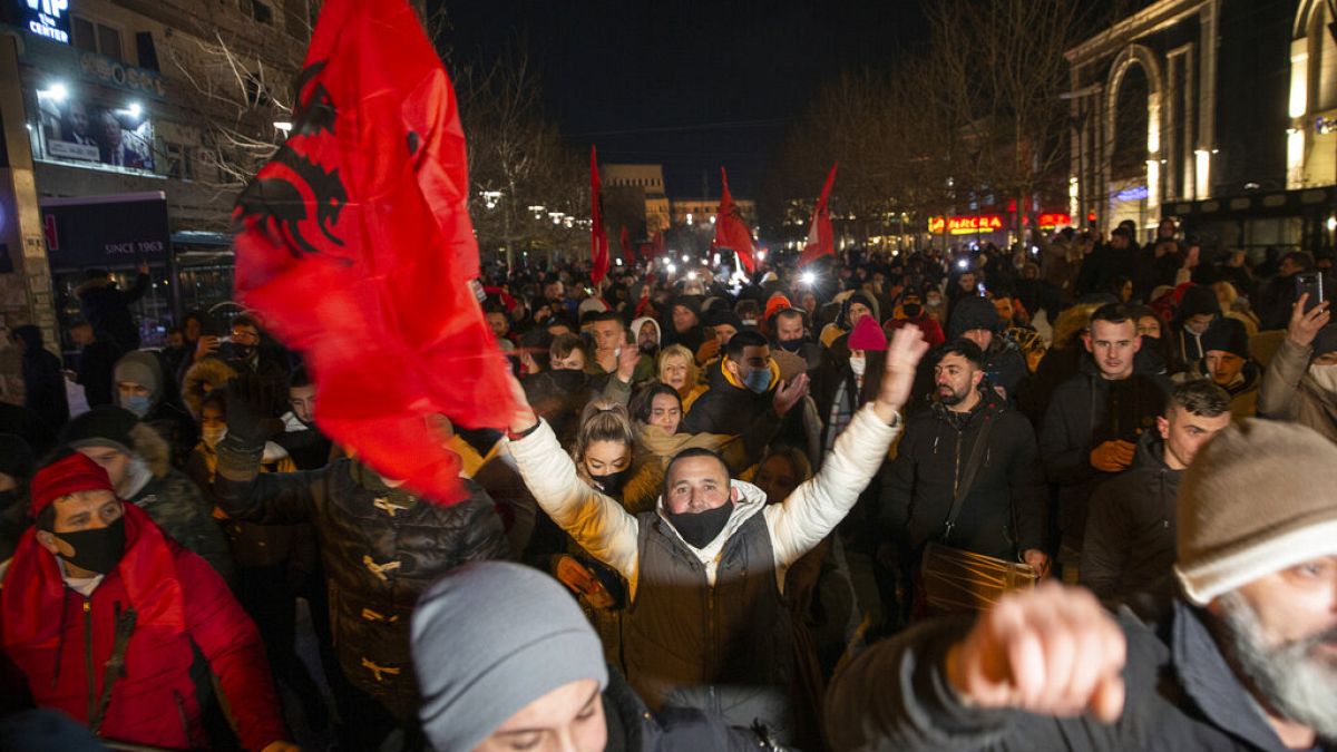 Supporters of the left-wing Self-Determination Movement party react in Pristina, the capitol of Kosovo, on Sunday, Feb. 14, 2021. 