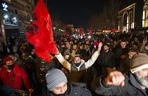 Supporters of the left-wing Self-Determination Movement party react in Pristina, the capitol of Kosovo, on Sunday, Feb. 14, 2021.