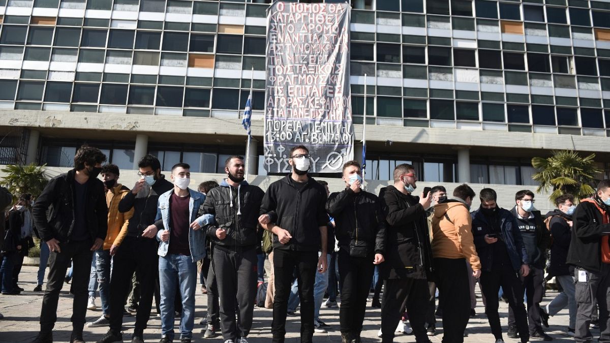 Protesters chant slogans at the University of Thessaloniki in northern Greece, on Monday, Feb. 22, 2021