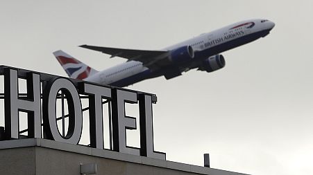 A plane takes off from Heathrow Airport in London, Friday, Feb. 5, 2021.