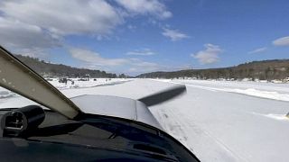 Pilot Scott Bahan in a Piper Cherokee small plane as it taxis to the runway.