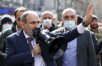Armenian Prime Minister Nikol Pashinyan speaks through a loudspeaker during a rally in the central in Yerevan, Armenia,