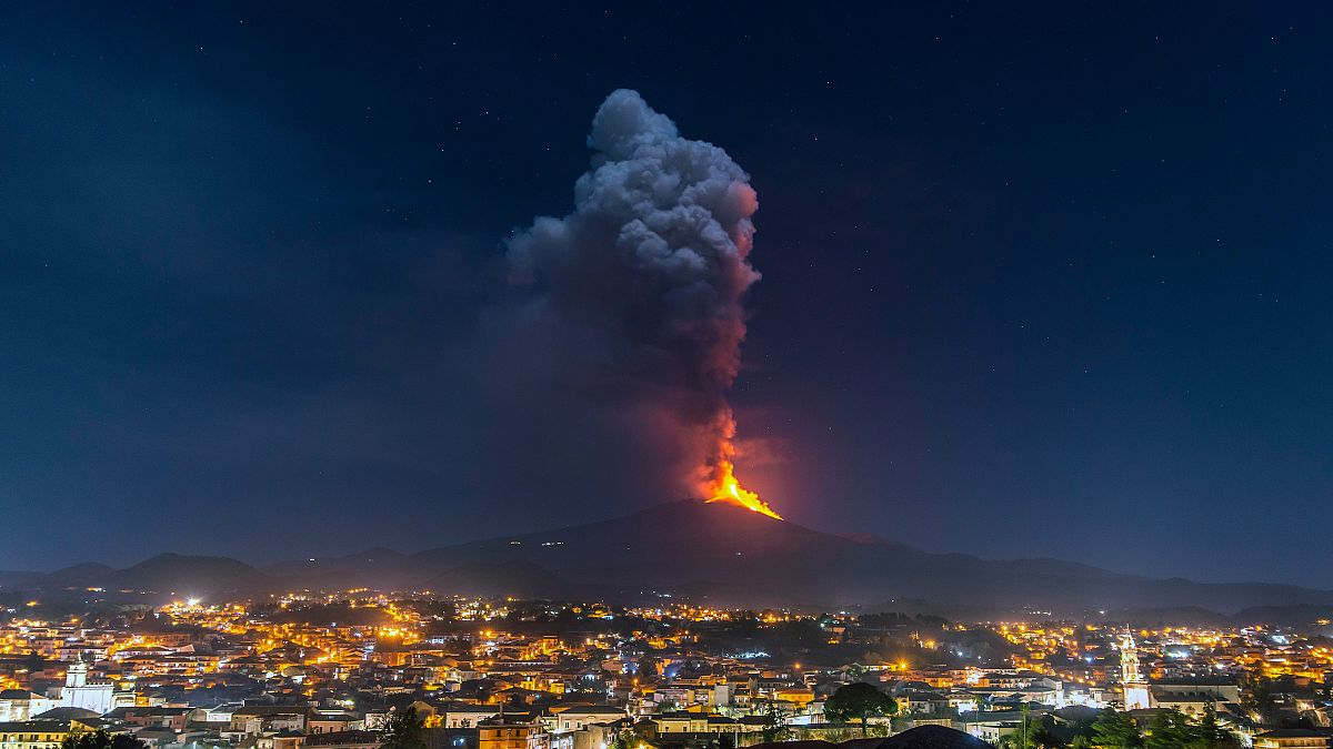 Flames and smoke billowing from a crater of the Mount Etna volcano, Sicily. February 24, 2021