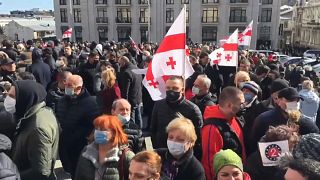 Protesters attend a rally following the detention of the United National Movement party leader Nika Melia, Tbilisi, Georgia, February 26, 2021.