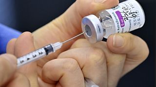 A nurse fills a syringe with the AstraZeneca COVID-19 vaccine at a health care center in Seoul Friday, Feb. 26, 2021. 