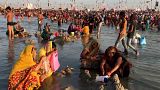 Devotees take sacred dip during India's Magh Mela