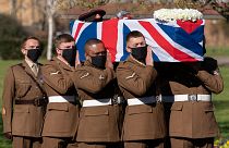Soldiers from the British Army's Yorkshire Regiment carry the coffin of Captain Tom Moore during his funeral service at Bedford Crematorium.