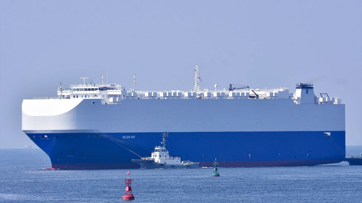 In this Aug. 14, 2020, photo, the vehicle cargo ship Helios Ray is seen at the Port of Chiba in Chiba, Japan.