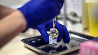 A nurse prepares a dose of the AstraZeneca COVID-19 vaccine at the Edouard Herriot hospital, in Lyon, France on Feb 6, 2021.