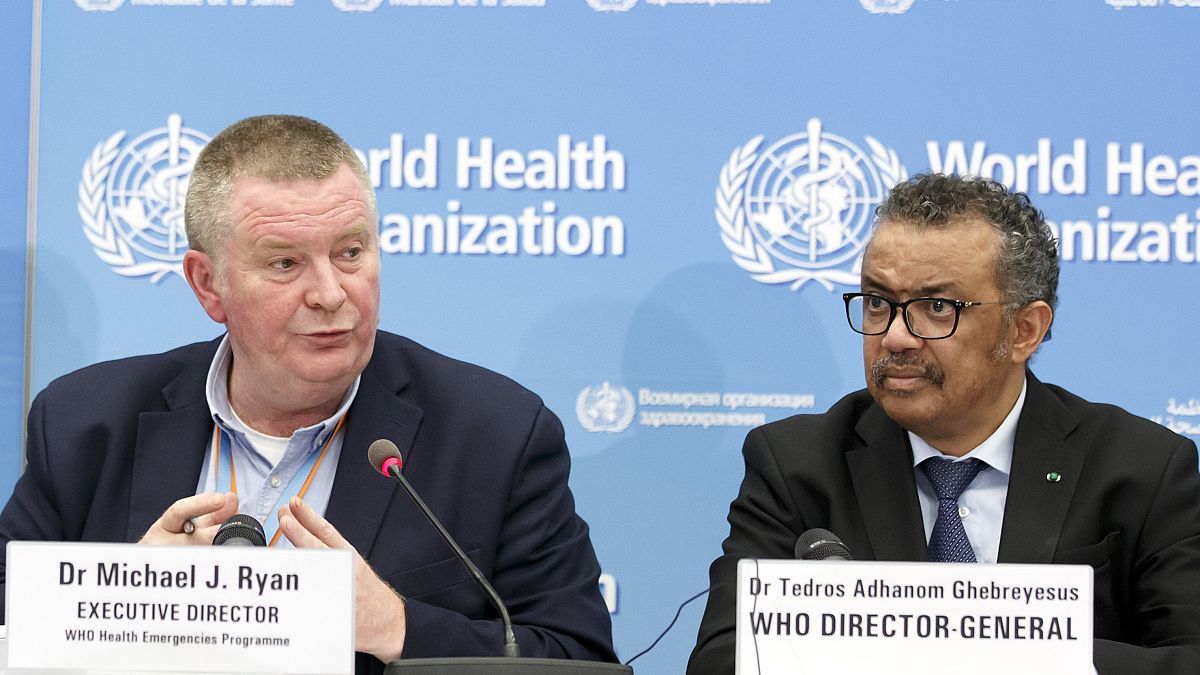 Michael Ryan (L), Executive Director of WHO's Health Emergencies programme, and WHO chief Tedros Adhanom Ghebreyesus on Feb. 24, 2020.