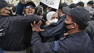 Thousands defy Algeria curfew as protests resurge