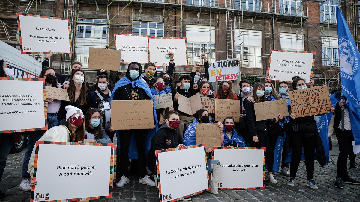 Students rally at the central university of Brussels to protest over economic difficulties sparked by the Covid-19 pandemic, in Brussels on March 1, 2021.