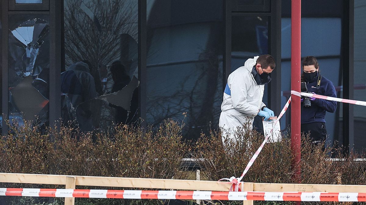 Forensic investigators search for evidence after an explosion at a Covid-19 testing centre in the town of Bovenkarpsel