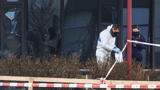 Forensic investigators search for evidence after an explosion at a Covid-19 testing centre in the town of Bovenkarpsel