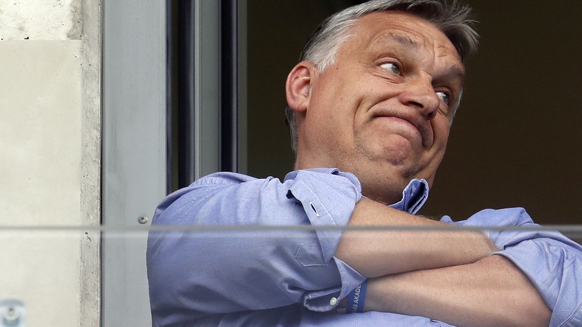 In this May 19, 2019 file photo, Hungarian Prime Minister Viktor Orban watches a soccer game in his hometown of Felcsut, Hungary. 