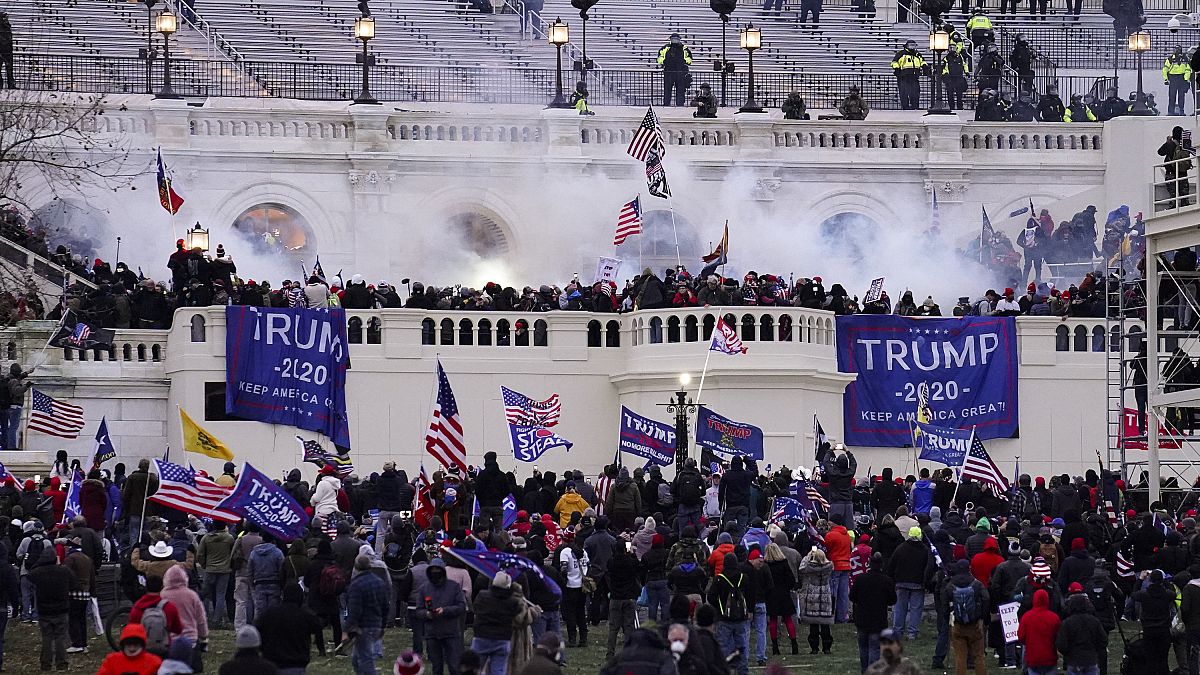 Wednesday, Jan. 6, 2021, file photo, rioters storm the Capitol, in Washington.