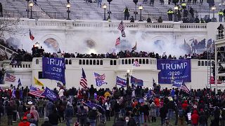 Wednesday, Jan. 6, 2021, file photo, rioters storm the Capitol, in Washington.