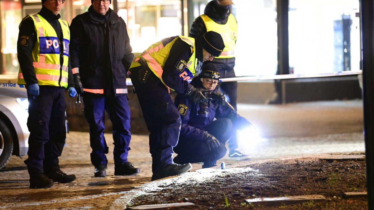 Police are seen in the area after several people were attacked in Vetlanda, Sweden, Wednesday, March 3, 2021