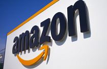 In this Thursday April 16, 2020 file photo, The Amazon logo is seen in Douai, northern France. Amazon paid zero corporate tax in Europe, despite a record sales income.