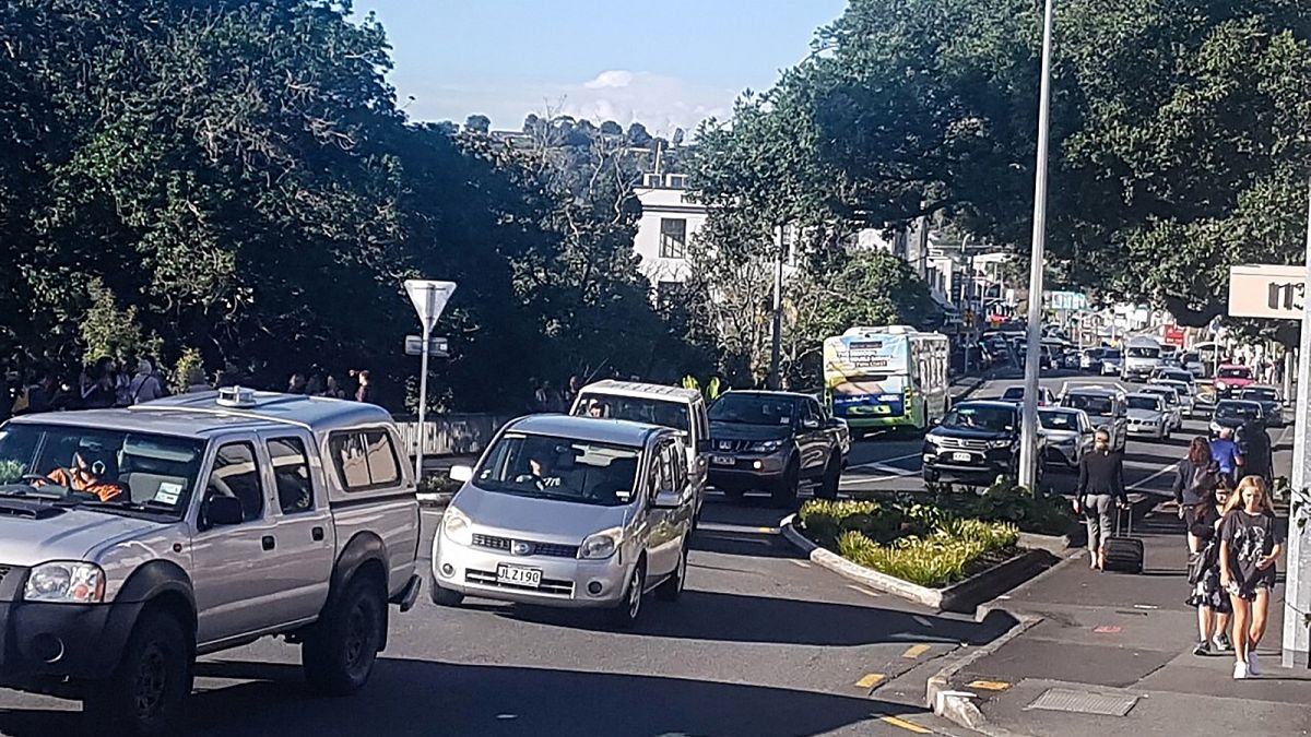 Traffic slowly works up to high ground at Whangarei, New Zealand, as a tsunami warning is issued Friday, March 5, 2021. 
