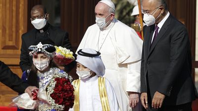 Le pape accueilli par le président irakien Barham Saleh au palais présidentiel à Bagdad le 5 mars 2021.