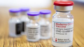 Newly arrived Moderna, right, and Pfizer-BioNTech vaccines against the new coronavirus are seen in Hungary.