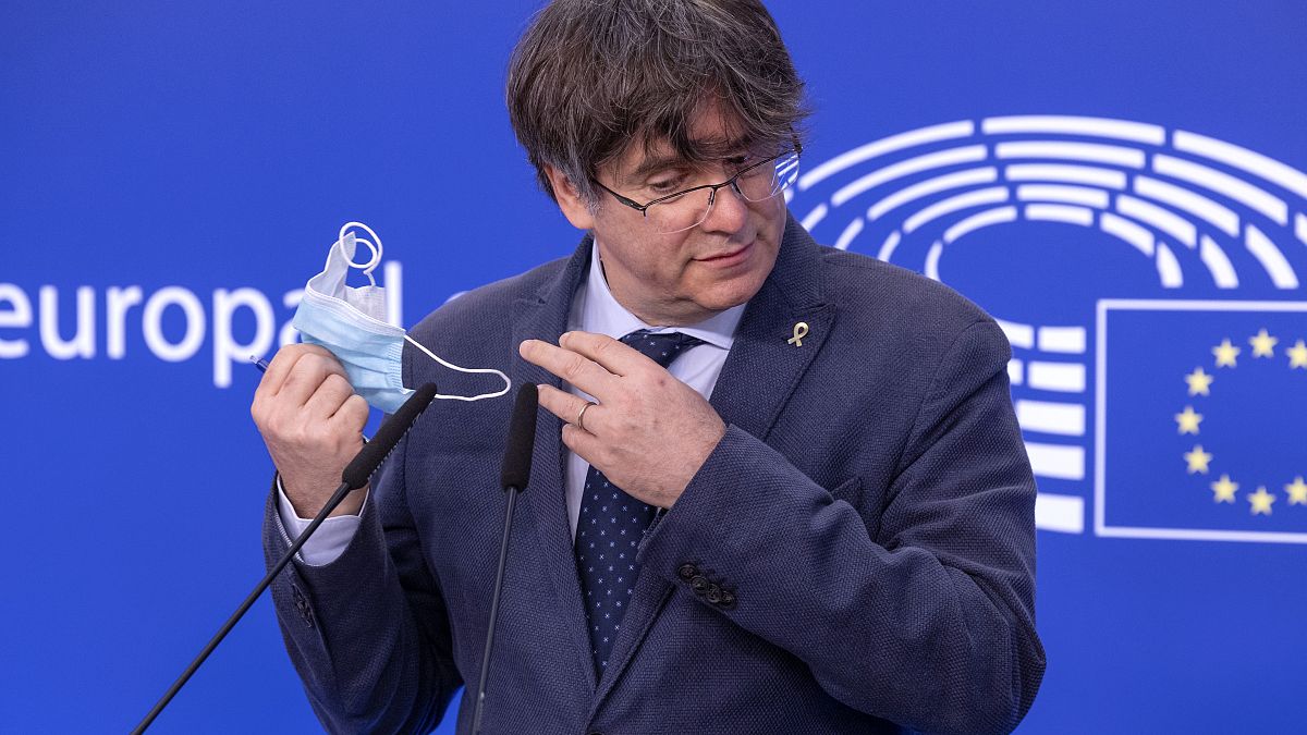 Former Catalan leader Carles Puigdemont as he prepares to address a media conference at the European Parliament in Brussels, Feb. 24, 2021.