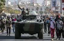 Senegalese troops arrive to assist police during protests against the arrest of opposition leader Ousmane Sonko in Dakar, Senegal, Friday, March 5, 2021.