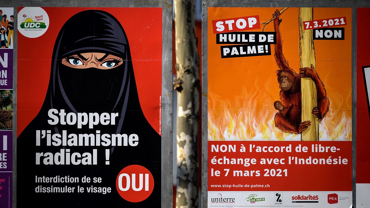 ملصق يدعم مبادرة لحظر تغطية الوجه في سويسرا. 2021/02/16