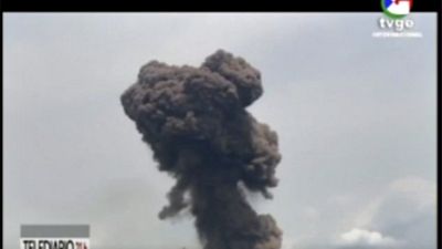 This TVGE image made from video shows smoke rising over the blast site at a military barracks in Bata, Equatorial Guinea