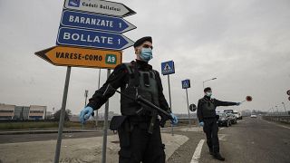 File photo: Carabinieri officers patrol one of the main access road to Bollate, in the outskirts of Milan, Italy. Feb 18, 2021.