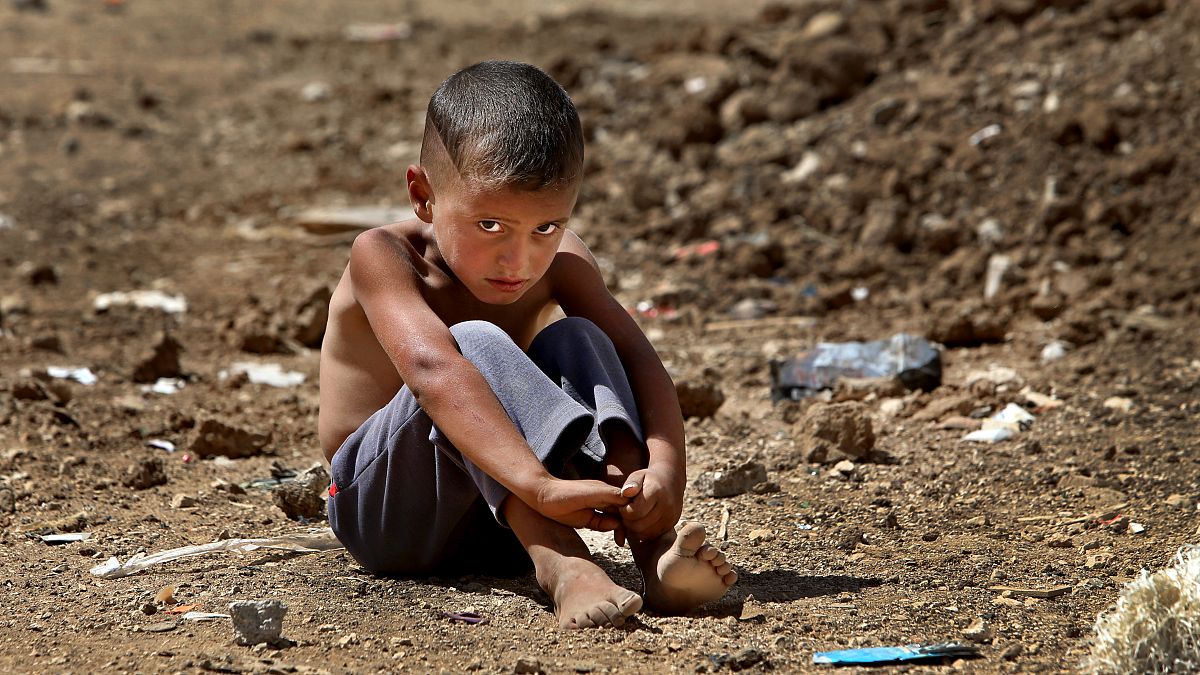 un enfant syrien dans un camp de réfugiés 