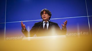 Member of European Parliament Carles Puigdemont speaks during a media conference at the European Parliament in Brussels, Tuesday, March 9, 2021