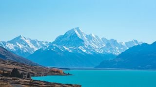 The instantly recognisable clear, blue waters and breath-taking mountains of New Zealand.