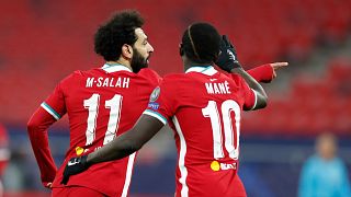 Liverpool, PSG reach Champions League quarters