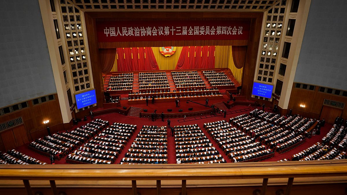 Leaders and delegates attend the closing session of Chinese People's Political Consultative Conference (CPPCC) at the Great Hall of the People in Beijing