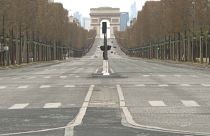 Deserted Avenue des Champs-Elysées with the Arc de Triomphe in the background - Paris, March 29, 2020