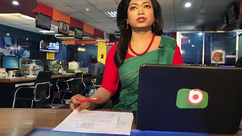 Bangladesh's first transgender news anchor Tashnuva Anan Shishir reads news bulletin , in Dhaka, Bangladesh, Tuesday, March 9, 2021. 