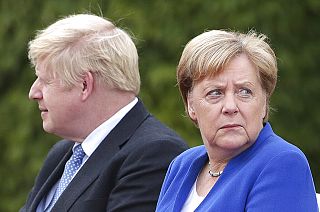 German Chancellor Angela Merkel welcomes Britain's Prime Minister Boris Johnson for a meeting at the Chancellery in Berlin, Germany, Wednesday, Aug. 21, 2019