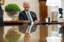 President Joe Biden speaks during a virtual meeting with Ireland's Prime Minister Micheal Martin on St. Patrick's Day, in the Oval Office of the White House.