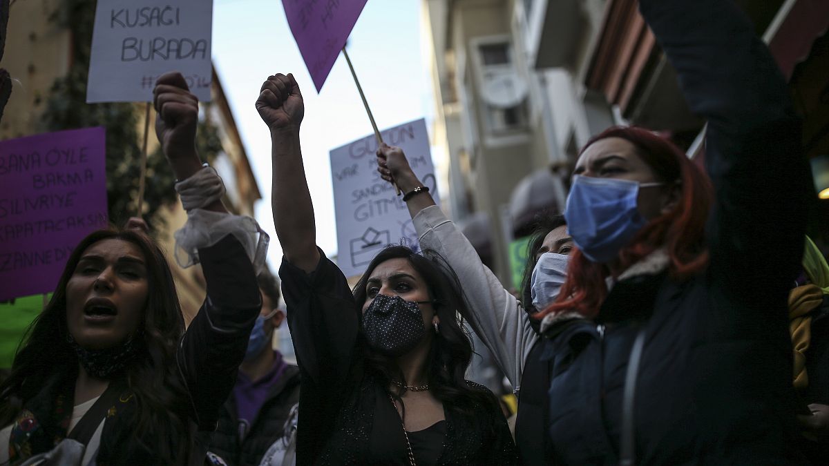 FILE - In this Monday, March 8, 2021, photo, protesters chant slogans during a rally to mark International Women's Day in Istanbul. 