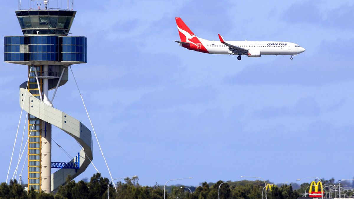 FILE: A Qantas jet prepares to land at Sydney Airport in Sydney, Oct. 31, 2011. 