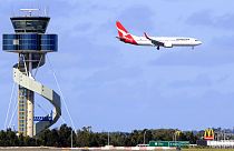 FILE: A Qantas jet prepares to land at Sydney Airport in Sydney, Oct. 31, 2011.