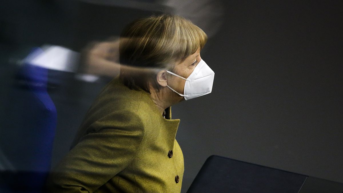 FILE: Chancellor Angela Merkel attends a debate of the German Parliament Bundestag about the coronavirus outbreak situation in Berlin, Germany, Thursday, March 4, 2021. 