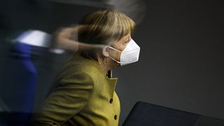 FILE: Chancellor Angela Merkel attends a debate of the German Parliament Bundestag about the coronavirus outbreak situation in Berlin, Germany, Thursday, March 4, 2021. 